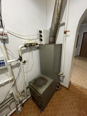 рация в машину: Твердотопливный отопительный котёл с варочной поверхностью -