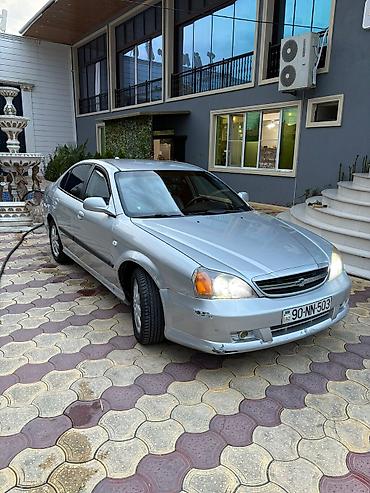 011 masini: Chevrolet Evanda: 2 l | 2005 il 350800 km Sedan — 1