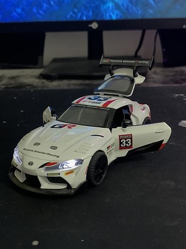 Искусство и коллекционирование: Коллекционная модель спортивного автомобиля Toyota Supra GT4 (Toyota — 2
