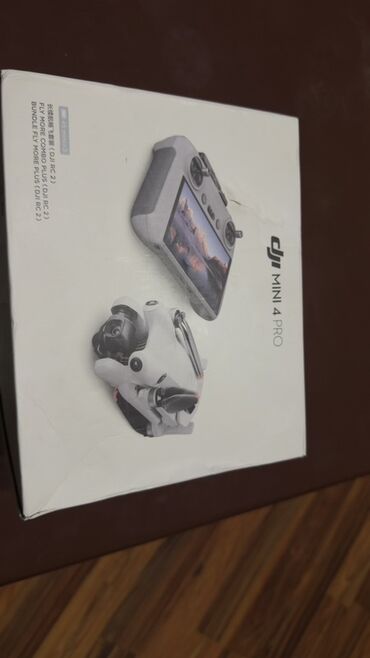 netbook çantası: DJI Mini 4 Pro – Fly More Combo Plus (DJI RC 2) Paket məzmunu: - DJI
