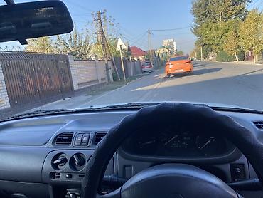 мд регион: Nissan March: 1998 г., 1.3 л, Автомат, Бензин, Хэтчбэк — 10