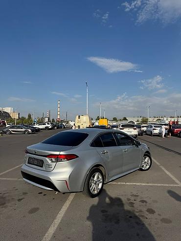 электромот: Toyota Corolla: 2021 г., Гибрид, Седан — 5