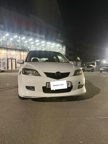 как можно купить машину в рассрочку: Mazda Demio: 2003 г., 1.5 л, Типтроник, Бензин, Седан