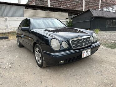 самая деловая машина: Представлен седан Mercedes-Benz E-Class W210 в темном цвете