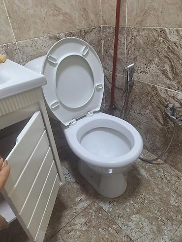 duş: Az işlənib 1 ayindi- Məhsul: Seramik unitaz + qapaq dəsti - Material — 1