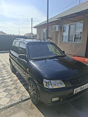 Mazda: Mazda Demio: 2001 г., 1.5 л, Вариатор, Бензин, Хэтчбэк — 2
