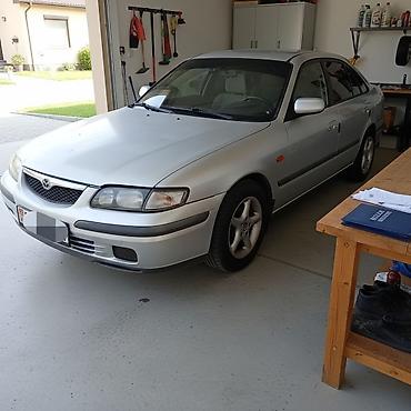 15: Mazda 626: 1998 г., 1.8 л, Механика, Бензин, Хэтчбэк — 2