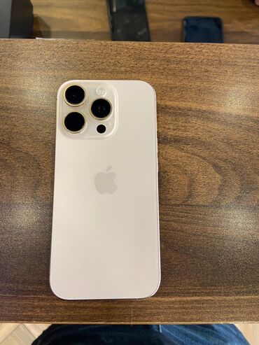 telef: IPhone 16 Pro, 128 GB, Desert Titanium, Kredit, Face ID, Simsiz şarj