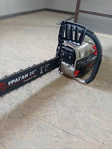 ниже: Бензопила Ubay Tools UB-520 - Тип: бензиновая цепная пила, 2‑тактный — 6
