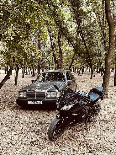 яди мото: Спортивный мотоцикл Kawasaki в черном цвете. Ключевые особенности: - — 3