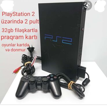 PS2 & PS1 (Sony PlayStation 2 & 1): Playsatation 2. Üzərində 2 pult . 32gb filəşkart yaddaş və filəşkartda
