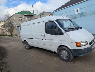 masin ucun uzlukler: Ford Transit markalı ağ rəngli yük maşını. Yük daşımaq üçün idealdır