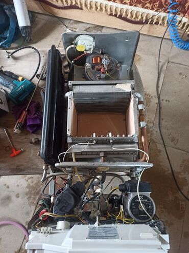 Kombilər: Demir dokum “Atron” qazla işləyən divar tipli kombi/qızdırıcı — 8