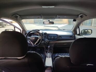 Honda: Honda Insight: 1.3 l | 2010 il — 7