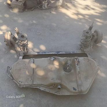 авто дом: Топливный бак и задняя балка в сборе для легкового автомобиля. Состав — 3