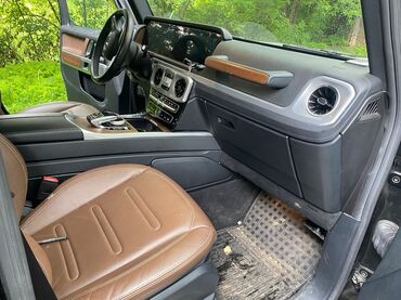 купить двигатель на газель: Салон автомобиля Mercedes-Benz G-Class, выполненный в коричневых и