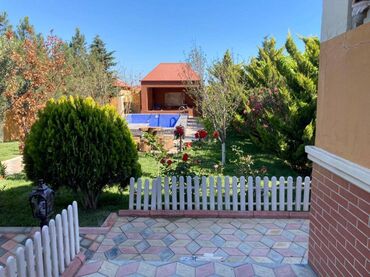 Bağ evlərinin satışı: Novxanıda əsas yoldan təxminən 200 metr məsafədə 12 sot torpaq — 10