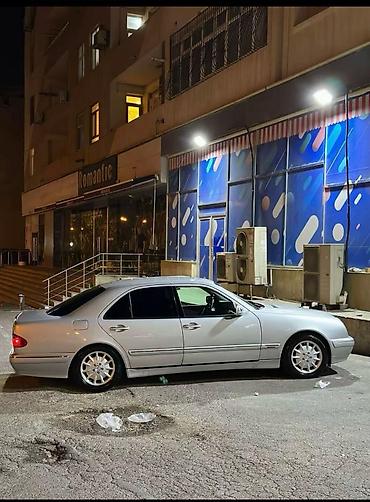 porsche satisi: Mercedes-Benz E-Class sedan (W210), gümüşü rəng. Xüsusiyyətlər: - — 3