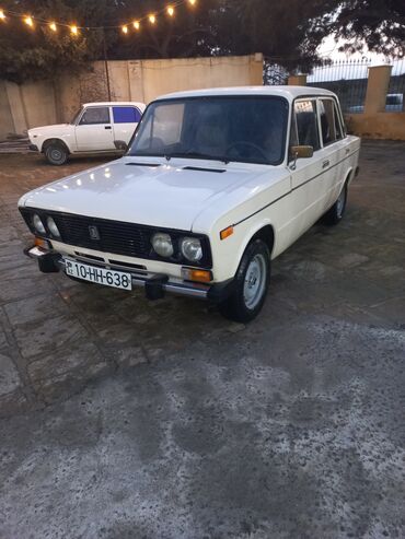 VAZ (LADA): VAZ 2106, ağ rəng, 4 qapılı sedan. - Klassik xarici görünüş: xrom ön — 1