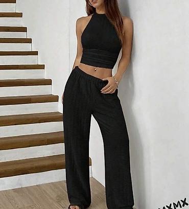 Kompleti: Ženski komplet – top bez rukava + široke pantalone. - Top: pripijena na lalafo.rs — 4 Kompleti: Ženski komplet – top bez rukava + široke pantalone. - Top: pripijena — 4