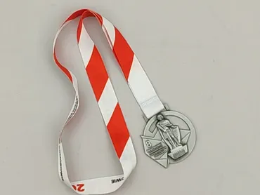 Używany medal pamiątkowy. Idealny stan. Medal z wizerunkiem figury i