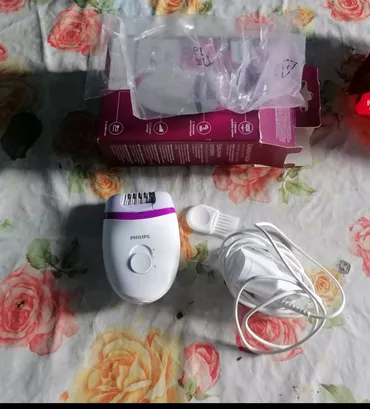 Epilator je nov, nije koriscen, otvoren je samo zbog slikanja