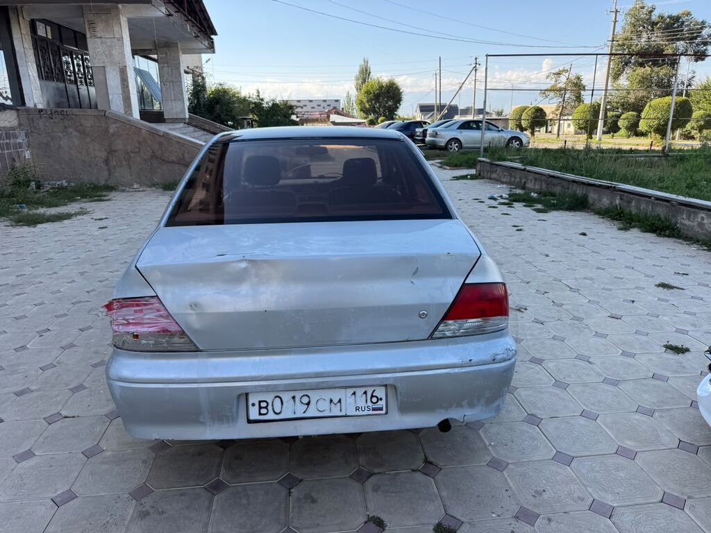 Mitsubishi Lancer: 2001 г., 1.6 л, Автомат, Бензин, Седан: фото 6