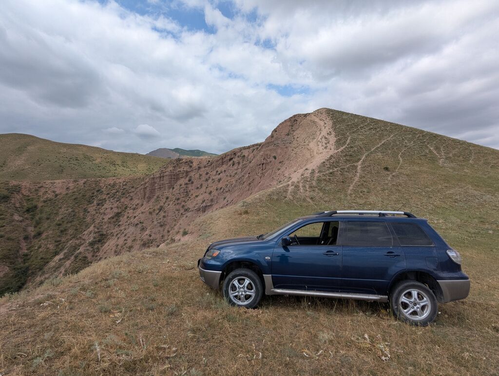 Mitsubishi Outlander: 2004 г., 2 л, Механика, Бензин, Кроссовер: фото 2