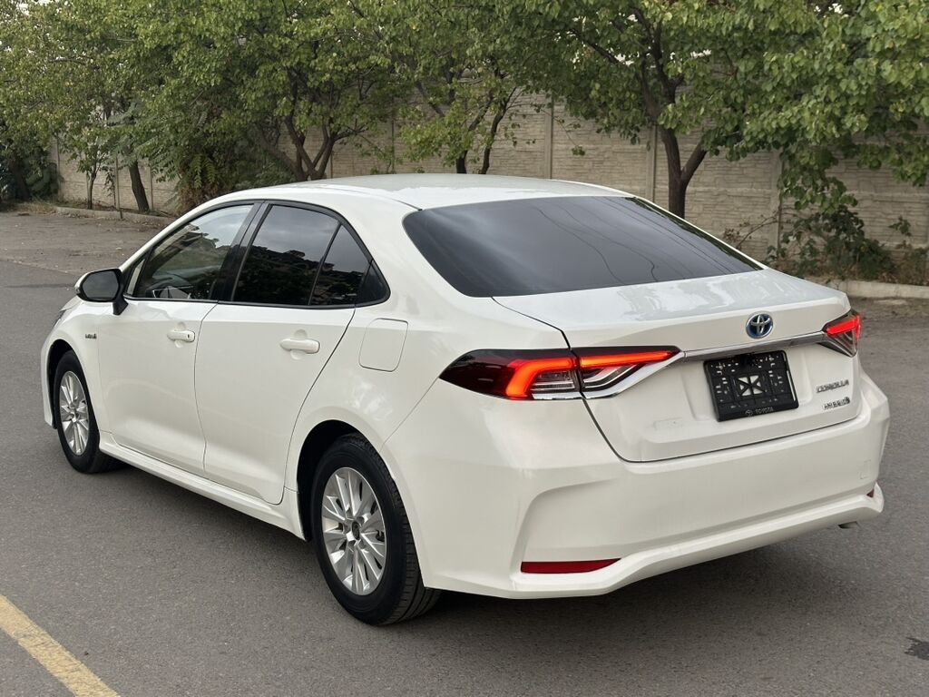 Toyota Corolla: 2023 г., 1.8 л, Автомат, Гибрид, Седан: фото 4