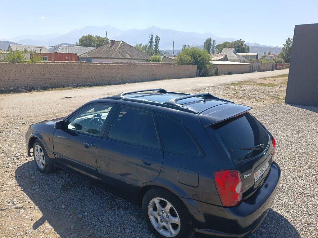 Mazda Familia: 2002 г., 0.2 л, Автомат, Бензин, Универсал: фото 1