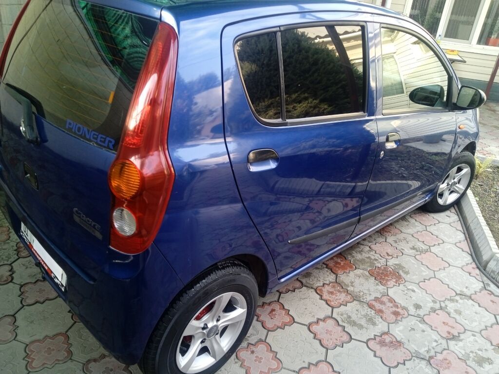 Daihatsu Cuore: 2009 г., 1 л, Механика: фото 5