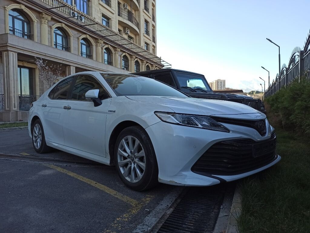 Toyota Camry: 2019 г., 2.5 л, Автомат, Гибрид, Седан: фото 5