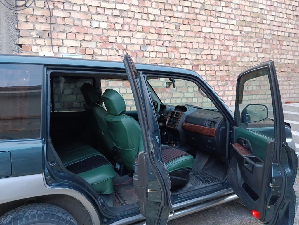 Mitsubishi Pajero Pinin: 2003 г., 2 л, Автомат, Бензин, Внедорожник: фото 4