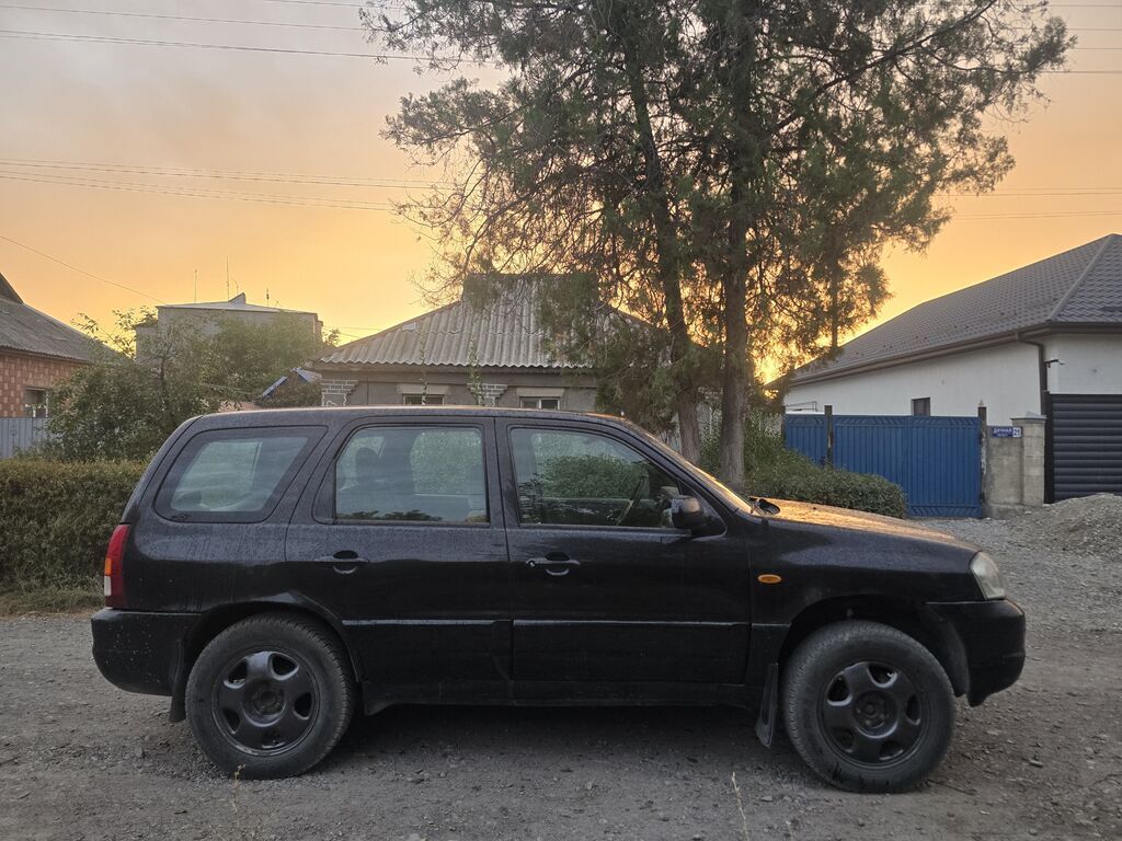 Mazda Tribute: 2000 г., 2 л, Механика, Газ, Кроссовер: фото 6