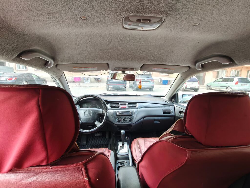 Mitsubishi Lancer: 2003 г., 1.6 л, Автомат, Газ, Седан — фото 6