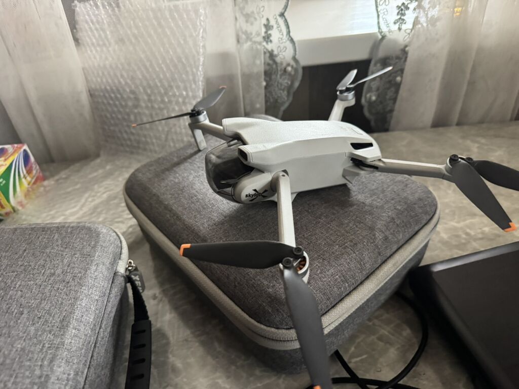 DJI Mini 3 — компактный ультралёгкий квадрокоптер с камерой и пультом: фото 4