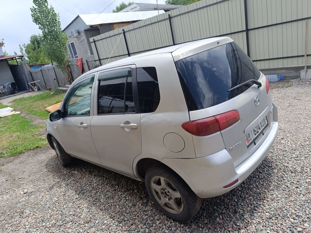 Mazda Demio: 2002 г., 1.3 л, Автомат, Бензин, Универсал: фото 4