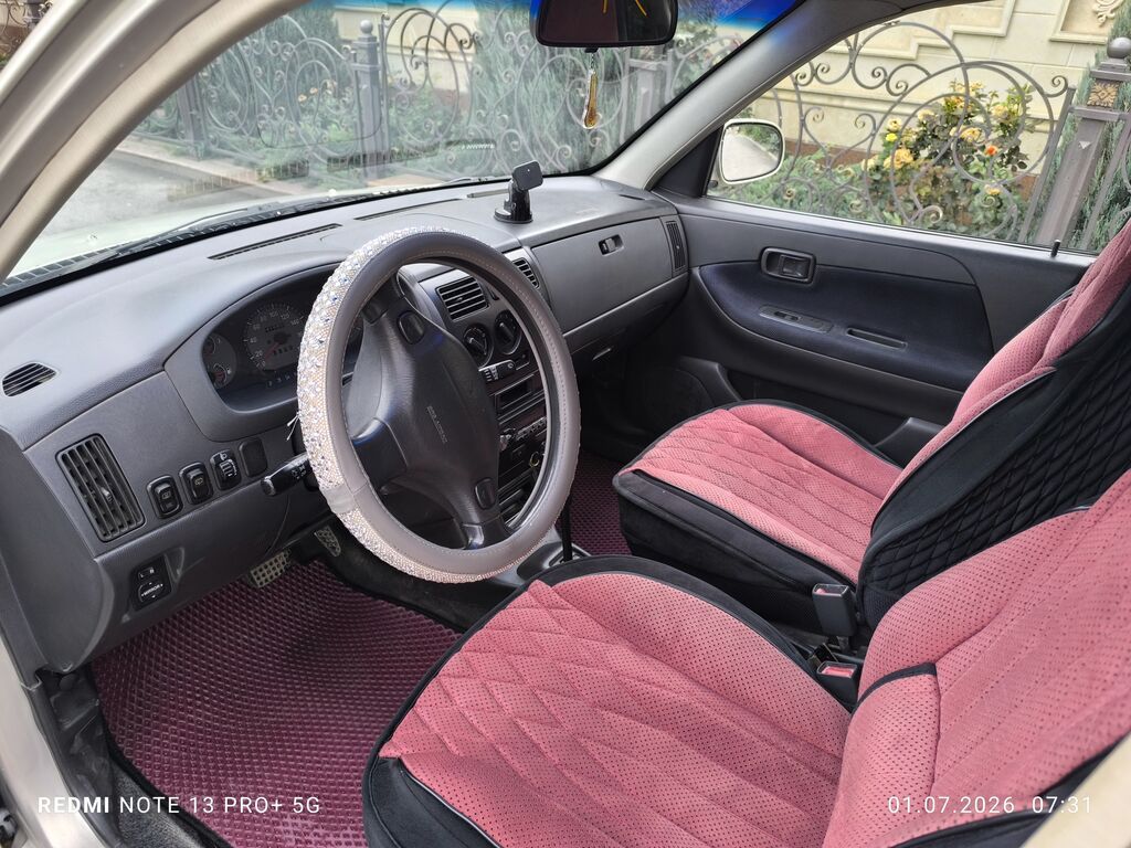 Daihatsu Sirion: 2002 г., 1 л, Автомат, Бензин: фото 7