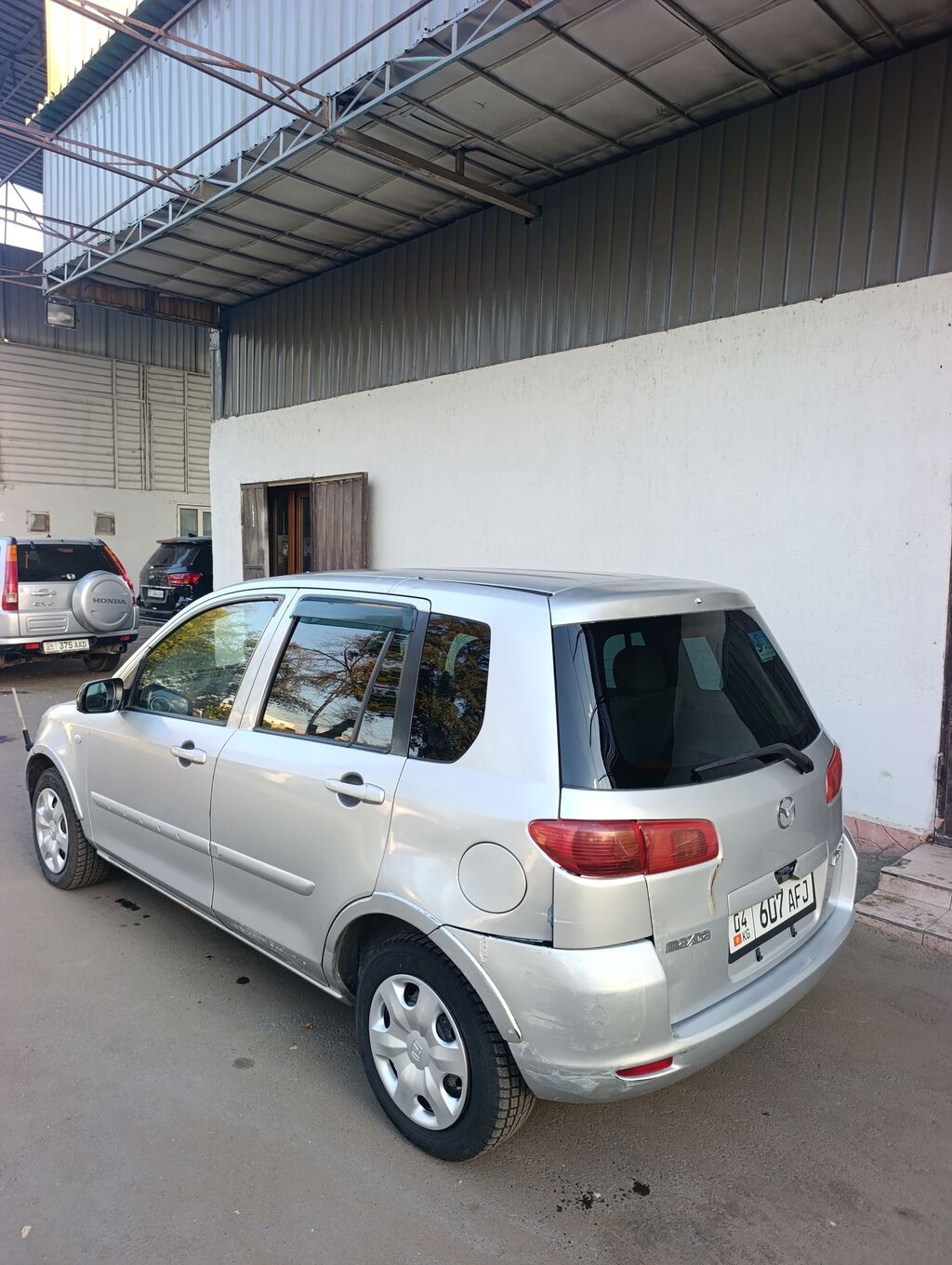 Mazda Demio: 2003 г., 1.3 л, Автомат, Бензин, Хэтчбэк: фото 6
