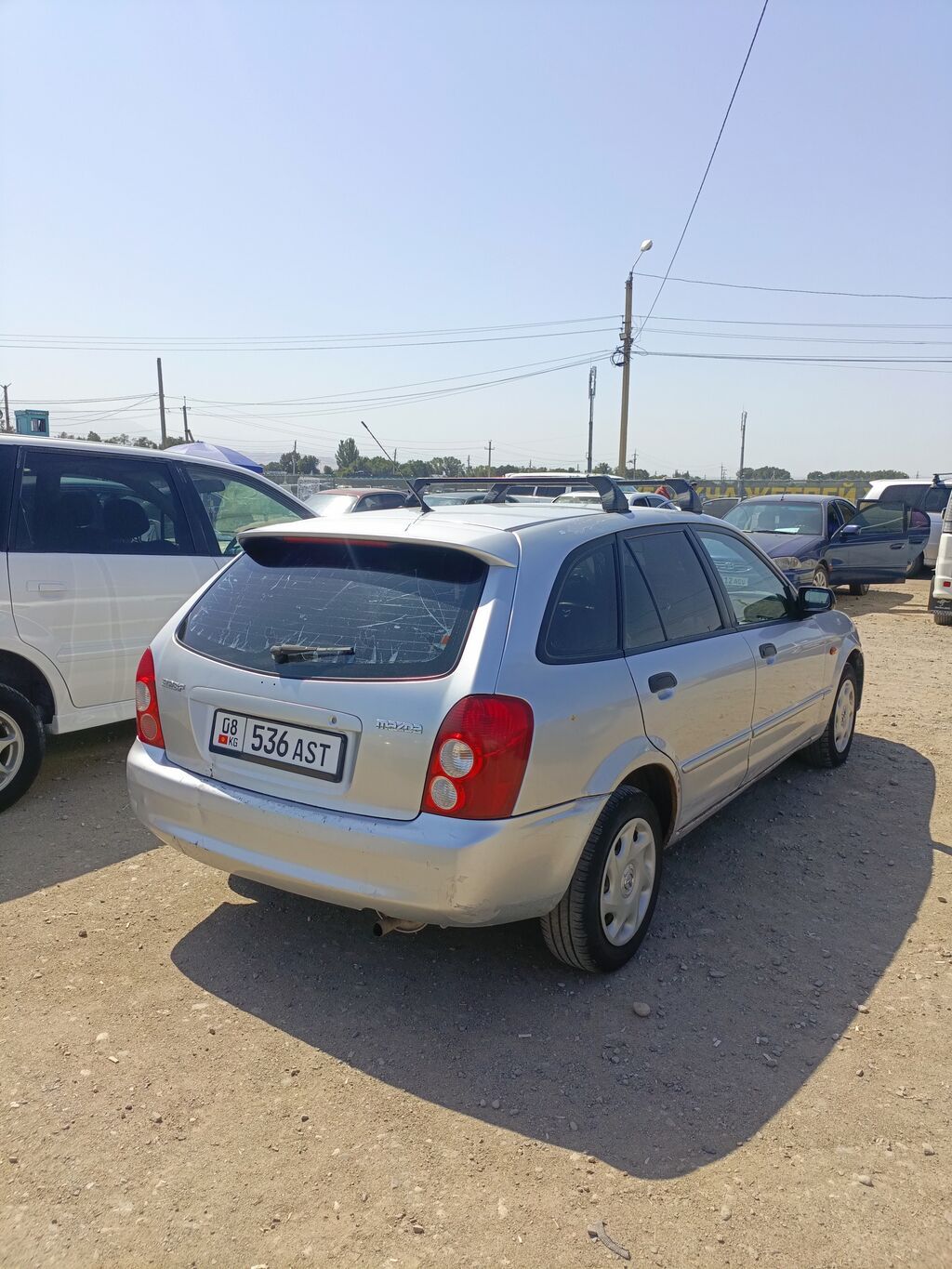 Mazda 323: 2002 г., Механика, Бензин, Универсал: фото 4