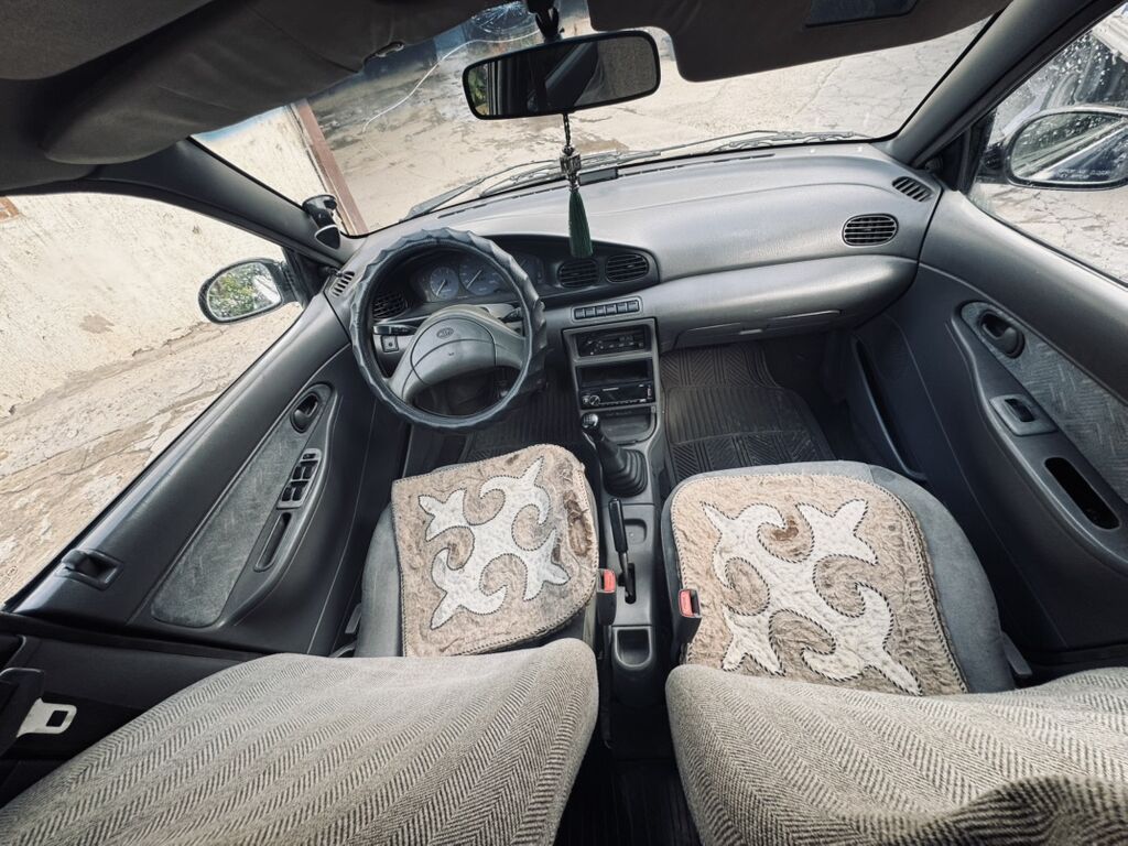 Kia Avella: 1998 г., 1.5 л, Механика, Бензин, Седан: фото 6