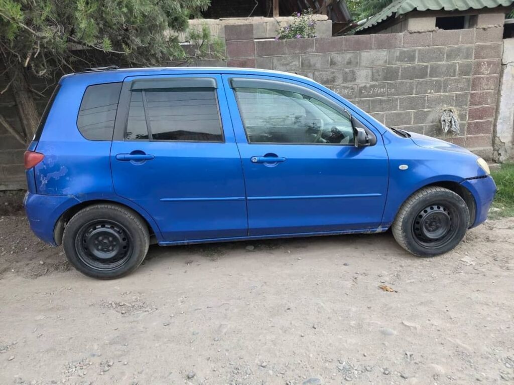 Mazda Demio: 2003 г., 1.3 л, Автомат, Бензин, Хэтчбэк: фото 5