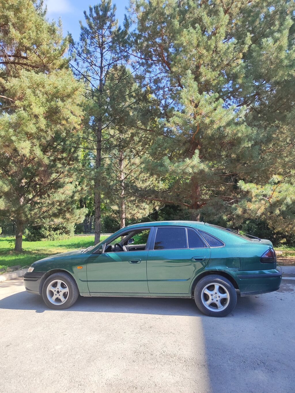 Продаётся легковой автомобиль седан тёмно‑зелёного цвета. Кузов: фото 2