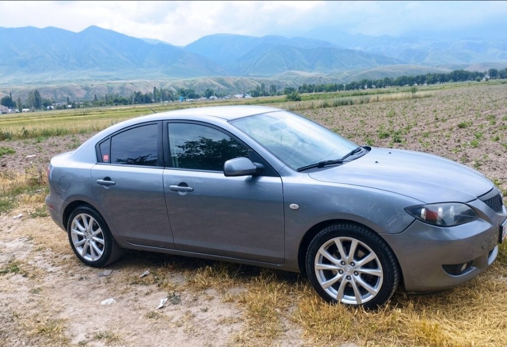 Mazda 3: 2008 г., 2 л, Автомат, Бензин, Седан: фото 2