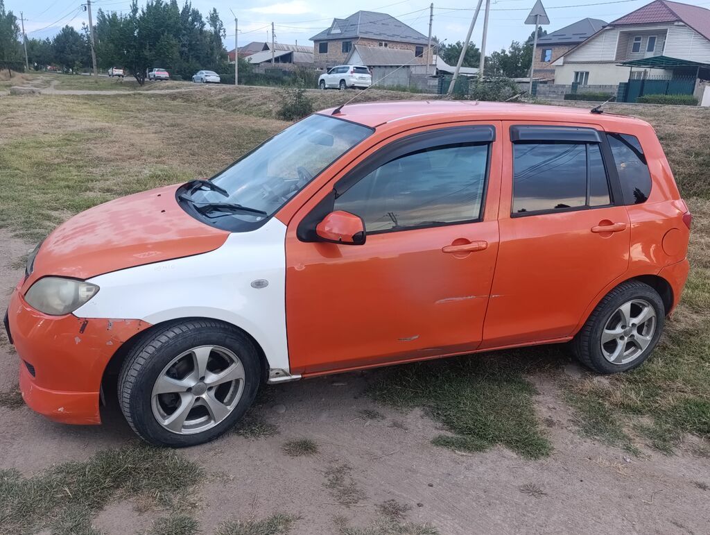 Mazda Demio: 2003 г., 1.3 л, Автомат, Хэтчбэк: фото 5