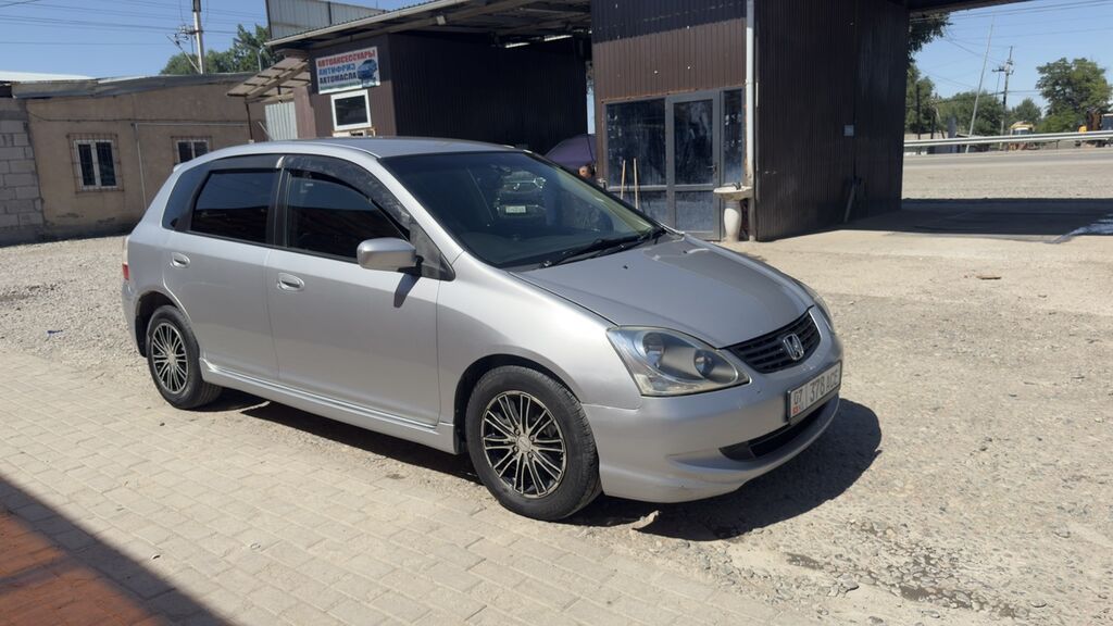 Honda Civic: 2004 г., 1.7 л, Вариатор, Газ, Хэтчбэк — фото 2