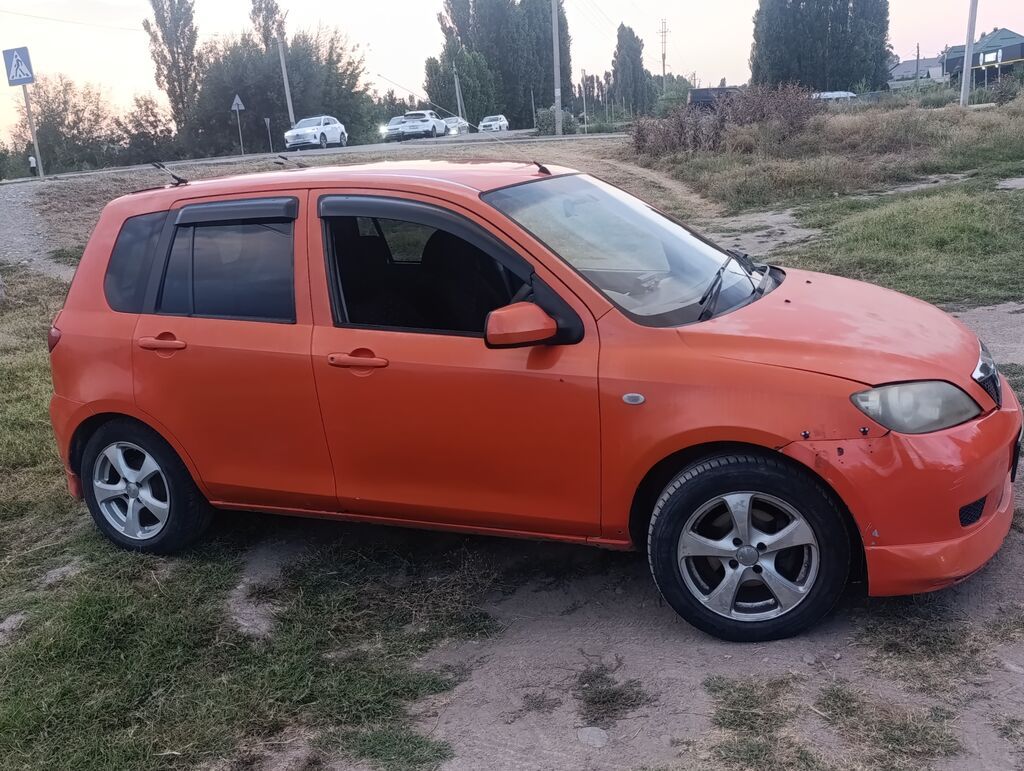 Mazda Demio: 2003 г., 1.3 л, Автомат, Хэтчбэк: фото 6