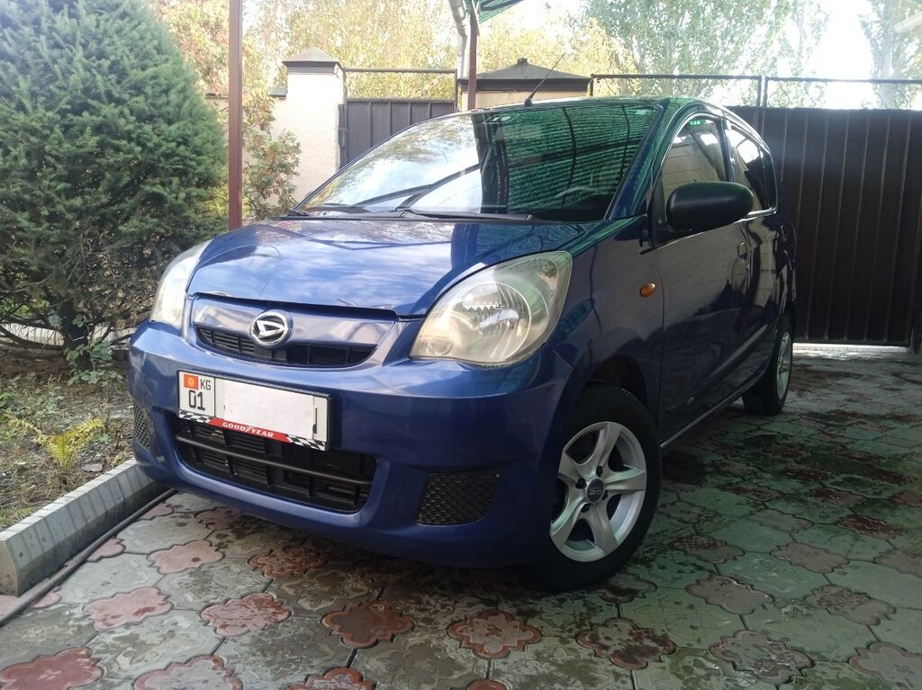 Daihatsu Cuore: 2009 г., 1 л, Механика: фото 1