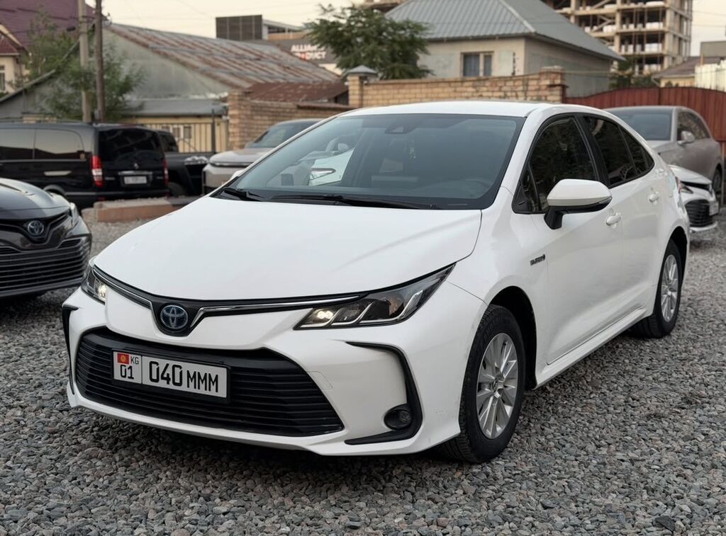 Toyota Corolla: 2022 г., 1.8 л, Автомат, Гибрид, Седан: фото 2
