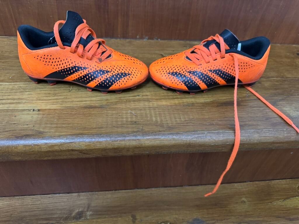 Kopačke: Dečije kopačke za fudbal, narandžaste boje sa crnim detaljima,nosene